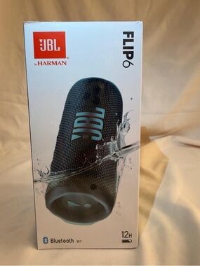 JBL Flip 6 Portable Bluetooth Waterproof Speaker - Black with Teal Logo